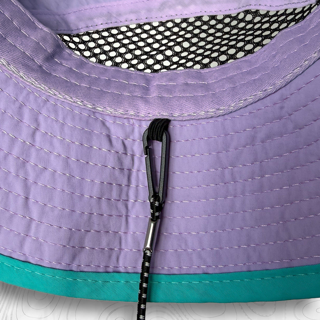 Bob club baroudeur tempo coloris "sea" (turquoise et Lila) Coté avec mesh aéré pour plus de confort 