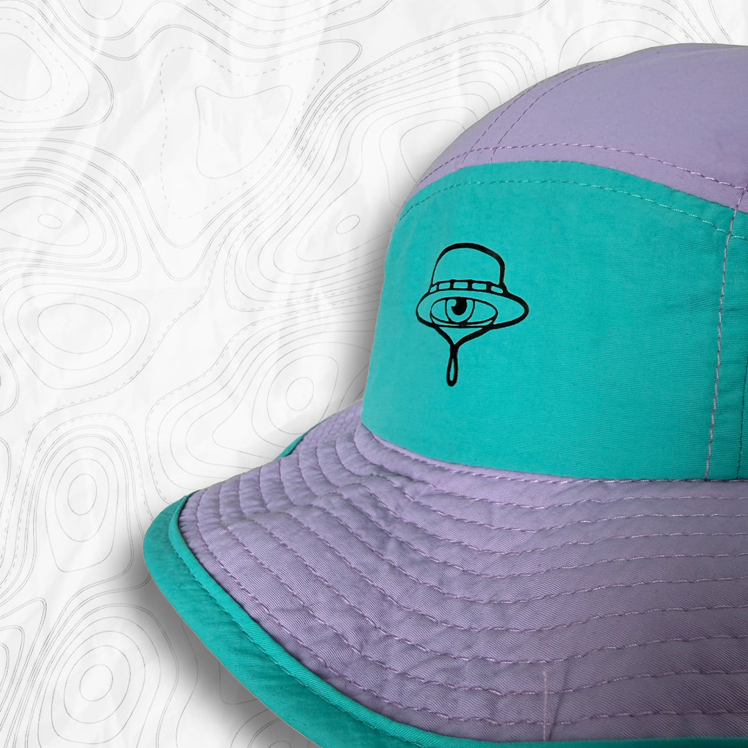 Bob club baroudeur tempo coloris "sea" (turquoise et Lila) Coté avec mesh aéré pour plus de confort 
